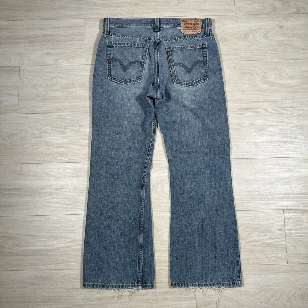 Levi's 527 Slim Bootcut Jeans Mens 34x30 Medium Blue Wash 100% Cotton Distressed